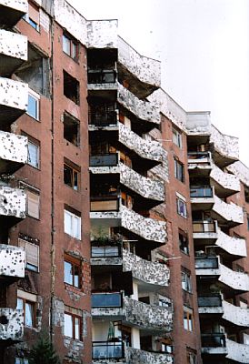 Bullet-riddled residential block